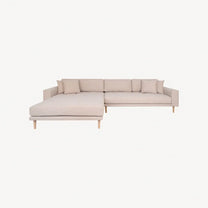 Grå modulsofa med chaiselong og lavt ryglæn - moderne komfort til stuen.